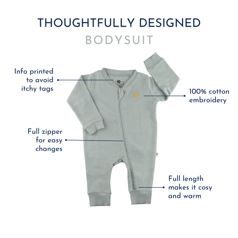 Made of soft, stretchy ribbed fabric, this works as a complete outfit. The long sleeves and pants make it comfortable in all weathers, and the 3/4th length zipper allows for easy wear Organic cotton organic muslin premium gift luxury gift sustainable clothes baby clothes baby gift newborn gift birthday gift onesie bodysuit